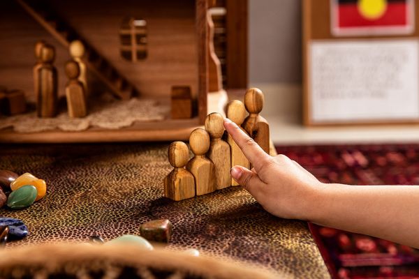 A children counting wooden figures