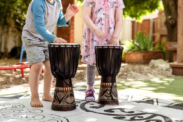 Children playing the drums